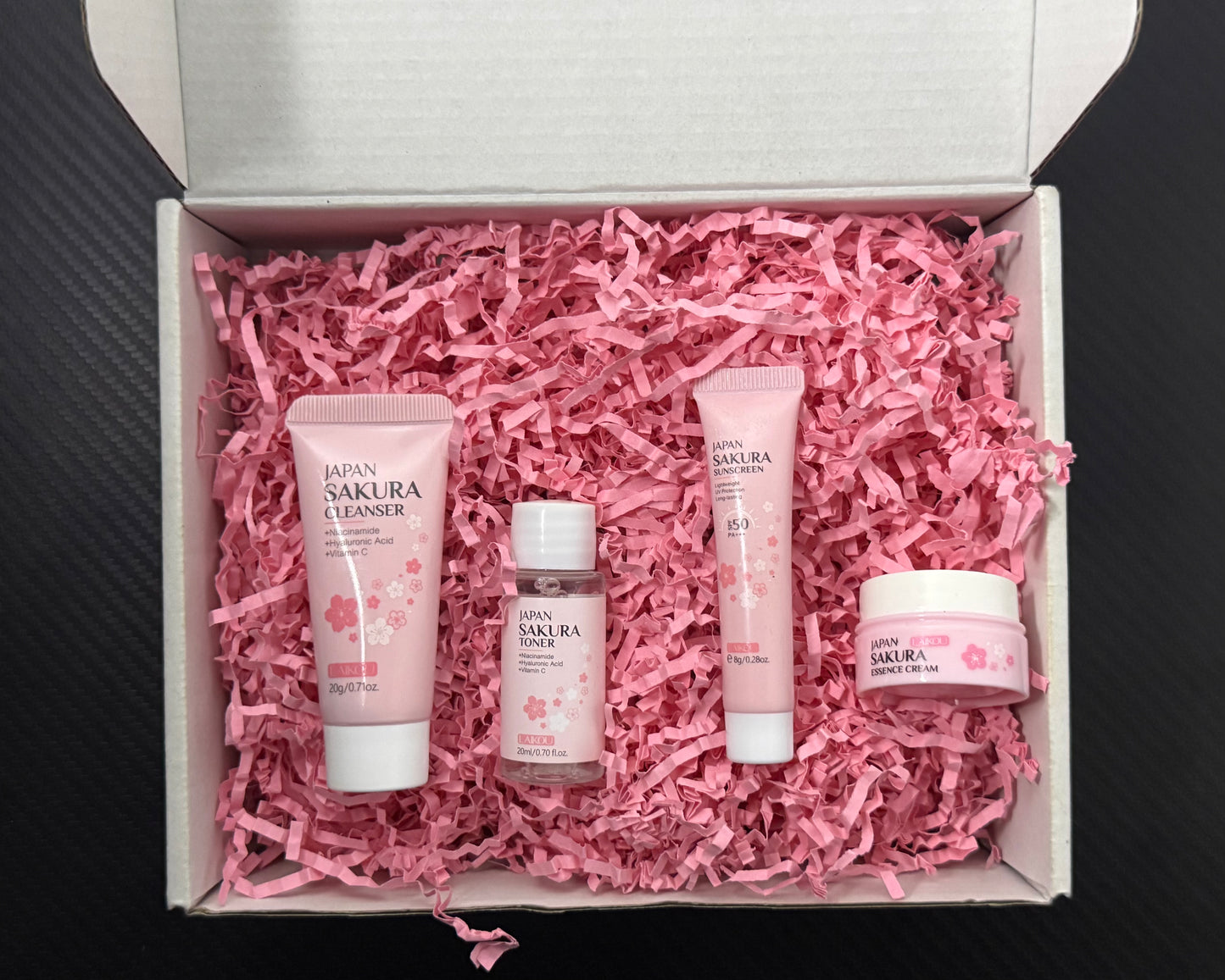 GlowBox Radiance Routine – 4-in-1 Sakura Care Set (MINI KIT)